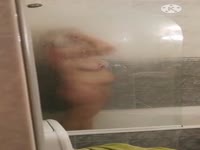 Mom washing her great tits!